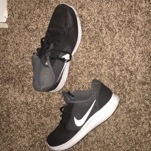 Black and grey Nike shoes